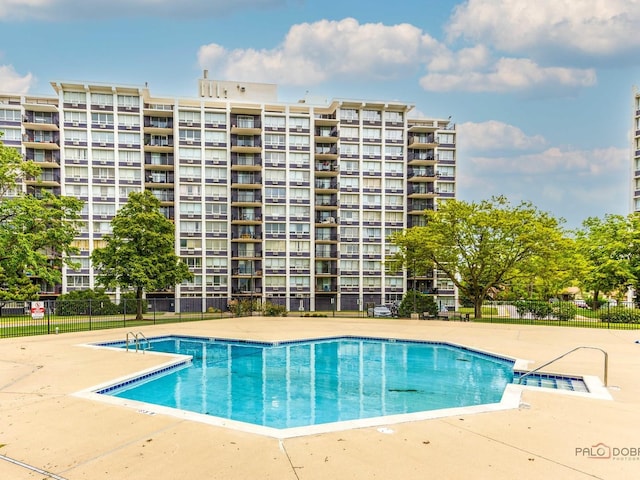 8801 W Golf Rd Unit 6J, Niles, IL 60714 - community pool featuring a patio