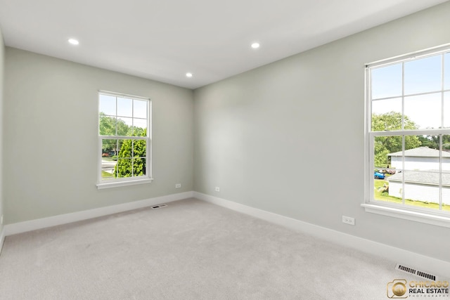 23653 W Ewing Dr, Plainfield, IL 60586 - unfurnished room featuring light colored carpet, recessed lighting, and baseboards