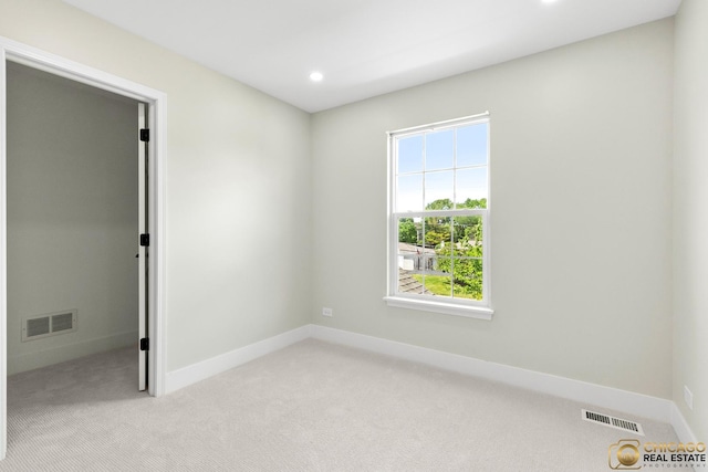 23653 W Ewing Dr, Plainfield, IL 60586 - unfurnished bedroom with light colored carpet, baseboards, and recessed lighting