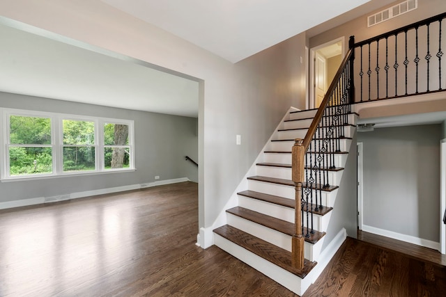 666 Barberry Rd, Highland Park, IL 60035 - stairs featuring wood finished floors and baseboards