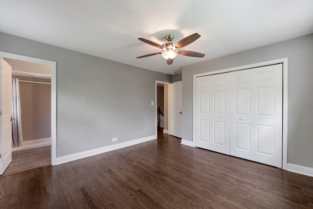 666 Barberry Rd, Highland Park, IL 60035 - unfurnished bedroom with dark wood finished floors, baseboards, a closet, and ceiling fan
