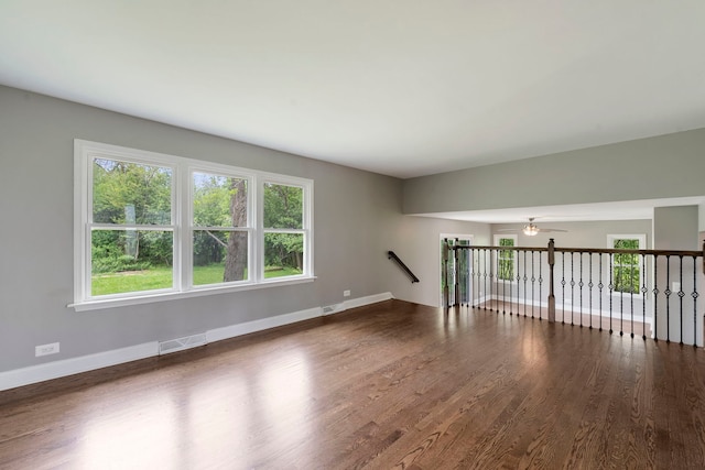 666 Barberry Rd, Highland Park, IL 60035 - unfurnished room with ceiling fan, wood finished floors, and baseboards