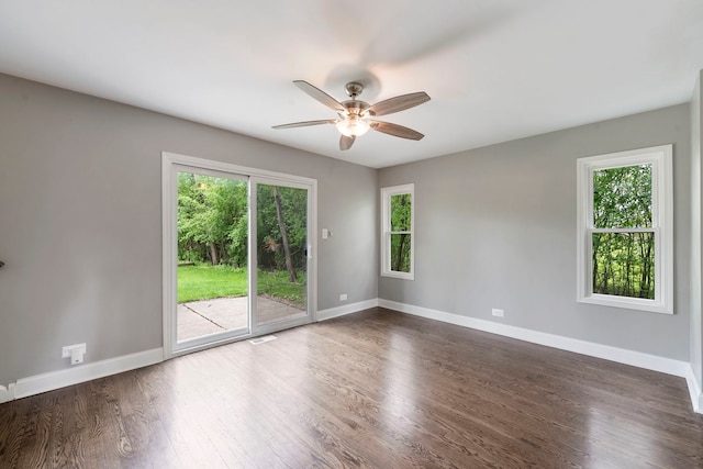 666 Barberry Rd, Highland Park, IL 60035 - unfurnished room with a ceiling fan, baseboards, and dark wood finished floors