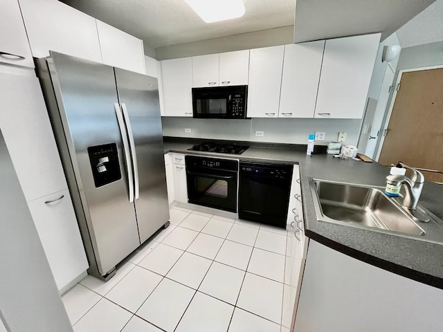 1720 Maple Ave Unit 670, Evanston, IL 60201 - kitchen featuring black appliances, a sink, dark countertops, and light tile patterned flooring