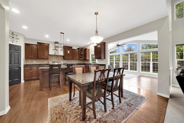 26809 Ashgate Xing, Plainfield, IL 60585 - dining room with plenty of natural light, a ceiling fan, recessed lighting, wood finished floors, and baseboards