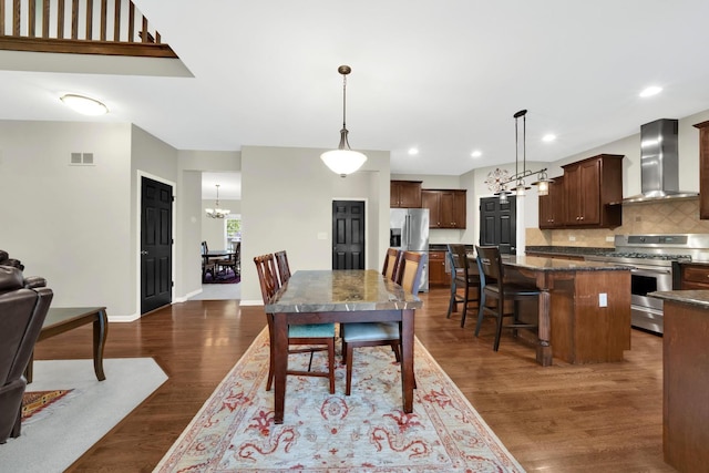 26809 Ashgate Xing, Plainfield, IL 60585 - dining room featuring dark wood-type flooring, a chandelier, baseboards, and recessed lighting