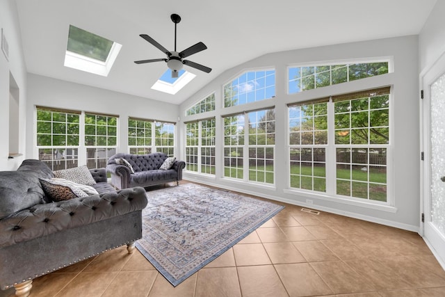 26809 Ashgate Xing, Plainfield, IL 60585 - sunroom / solarium with tile patterned flooring, a skylight, vaulted ceiling, and plenty of natural light