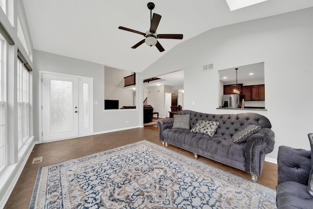 26809 Ashgate Xing, Plainfield, IL 60585 - tiled living room with vaulted ceiling and a ceiling fan