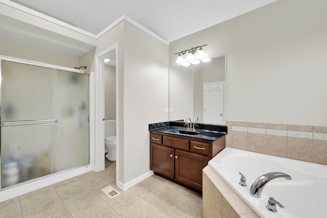 26809 Ashgate Xing, Plainfield, IL 60585 - full bath featuring a bath, a stall shower, vanity, tile patterned floors, and toilet