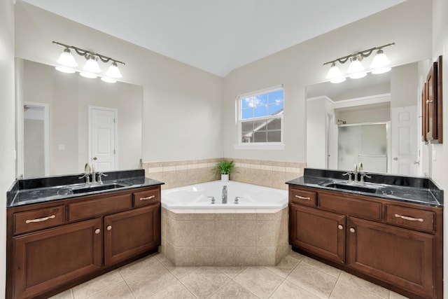 26809 Ashgate Xing, Plainfield, IL 60585 - bathroom with tile patterned flooring, a garden tub, two vanities, and a shower stall