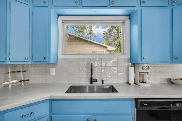 1602 Normandy Dr, Champaign, IL 61821 - kitchen featuring dishwasher, a sink, and blue cabinets