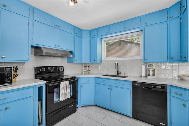 1602 Normandy Dr, Champaign, IL 61821 - kitchen featuring under cabinet range hood, black appliances, a sink, and blue cabinets