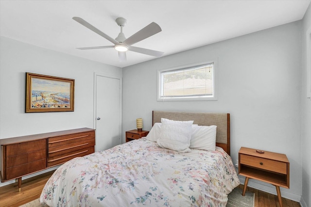 1602 Normandy Dr, Champaign, IL 61821 - bedroom with wood finished floors and ceiling fan