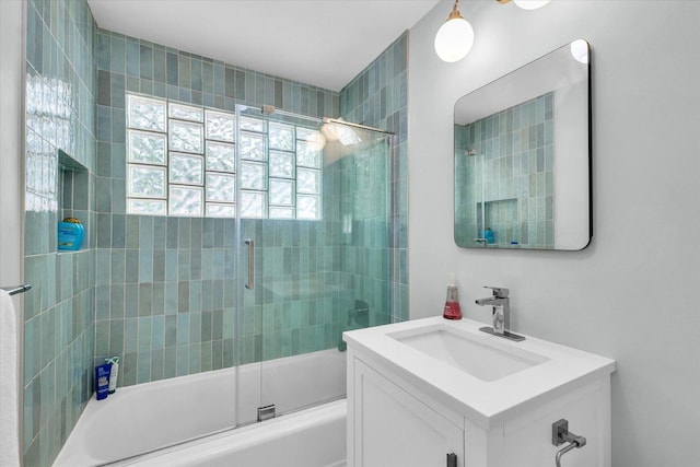 1602 Normandy Dr, Champaign, IL 61821 - full bathroom featuring vanity and combined bath / shower with glass door