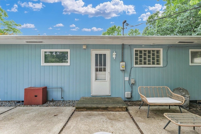 1602 Normandy Dr, Champaign, IL 61821 - doorway to property featuring a patio
