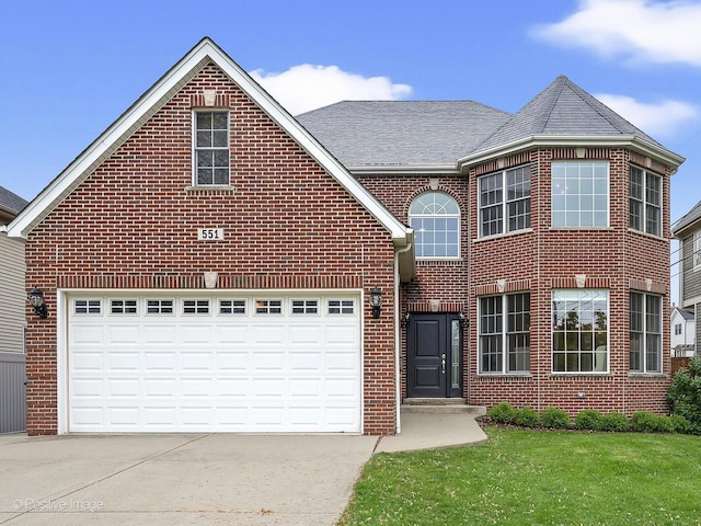 551 W 3rd St, Elmhurst, IL 60126 - traditional-style home featuring concrete driveway, brick siding, a front yard, and a shingled roof
