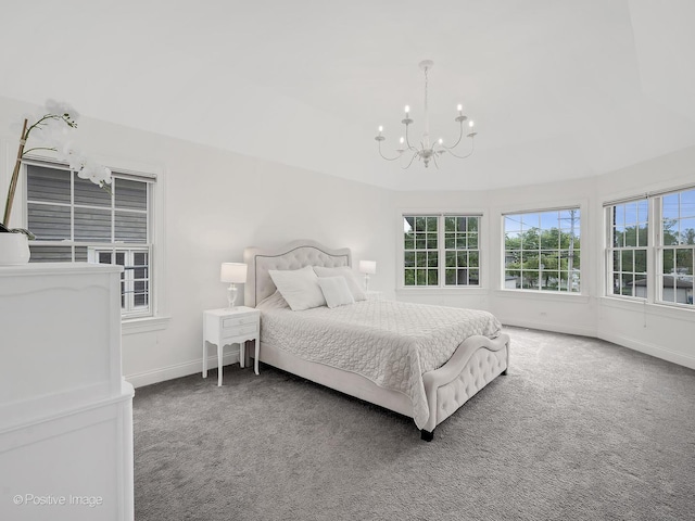 551 W 3rd St, Elmhurst, IL 60126 - carpeted bedroom featuring a chandelier and baseboards