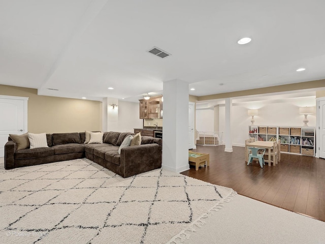 551 W 3rd St, Elmhurst, IL 60126 - living room featuring wet bar, wood finished floors, and recessed lighting