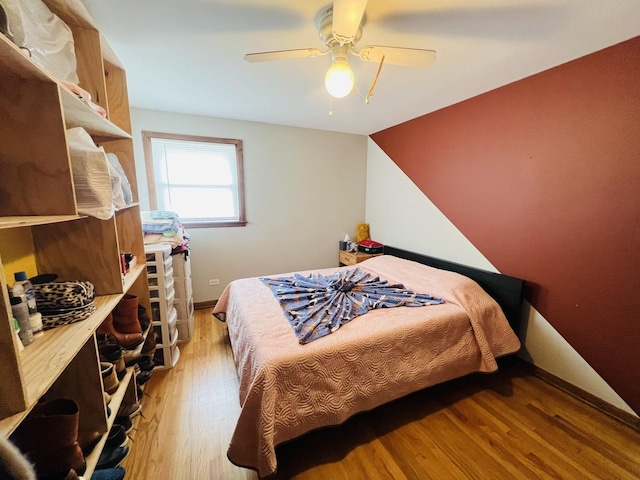 6968 W Diversey Ave Unit 7, Chicago, IL 60707 - bedroom with light wood-style floors and ceiling fan