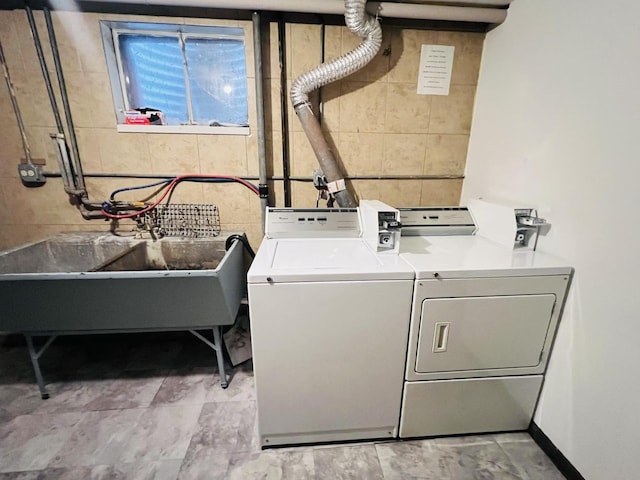 6968 W Diversey Ave Unit 7, Chicago, IL 60707 - washroom featuring a sink and washing machine and clothes dryer