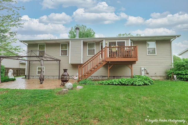 140 Shadowbrook Dr, Capron, IL 61012 - back of property featuring a lawn, a patio, a deck, and stairs