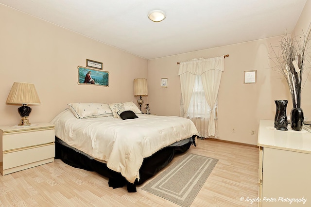 140 Shadowbrook Dr, Capron, IL 61012 - bedroom featuring light wood-style flooring and baseboards