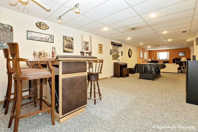 140 Shadowbrook Dr, Capron, IL 61012 - indoor dry bar with carpet floors and ceiling fan