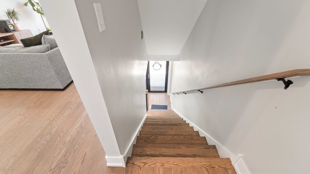 3124 S Benson St Unit 6, Chicago, IL 60608 - stairway featuring wood finished floors and baseboards