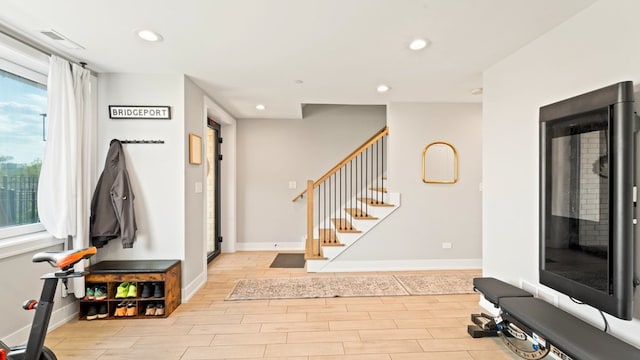3124 S Benson St Unit 6, Chicago, IL 60608 - foyer entrance with recessed lighting, light wood-style floors, stairs, and baseboards