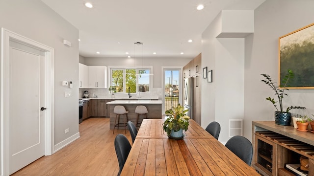 3124 S Benson St Unit 6, Chicago, IL 60608 - dining room featuring light wood-type flooring and recessed lighting