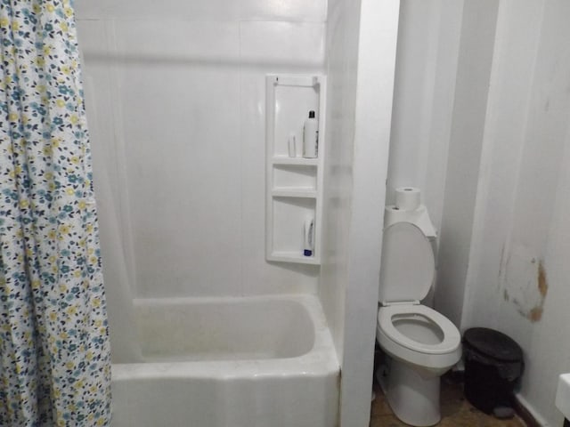 full bathroom with toilet and shower / bath combination with curtain
