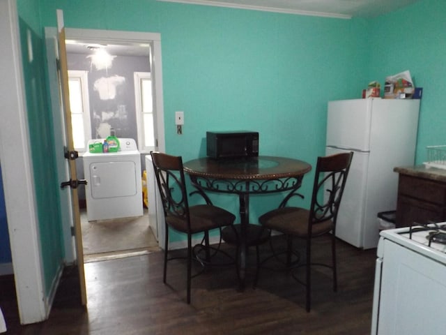 dining space featuring wood finished floors