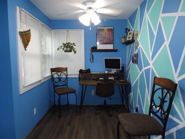 home office featuring wood finished floors and a ceiling fan