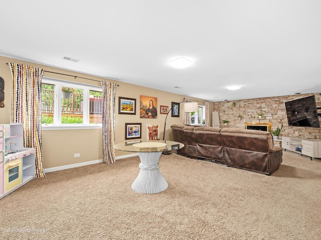7235 Kiowa Ln, Palos Heights, IL 60463 - living area with carpet floors, a fireplace, and baseboards