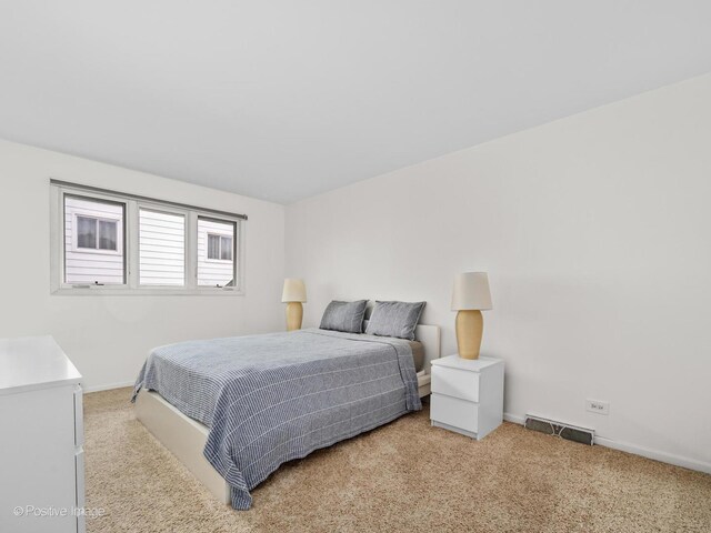 7235 Kiowa Ln, Palos Heights, IL 60463 - bedroom with light colored carpet and baseboards