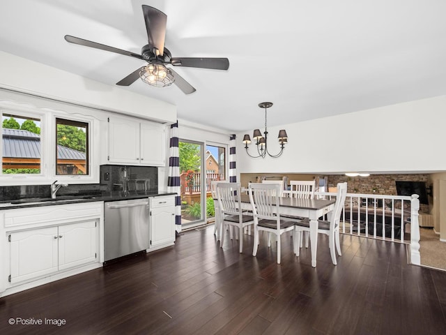 7235 Kiowa Ln, Palos Heights, IL 60463 - dining area with a chandelier, ceiling fan, and dark wood-style flooring