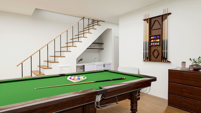 playroom with wood finished floors and billiards table