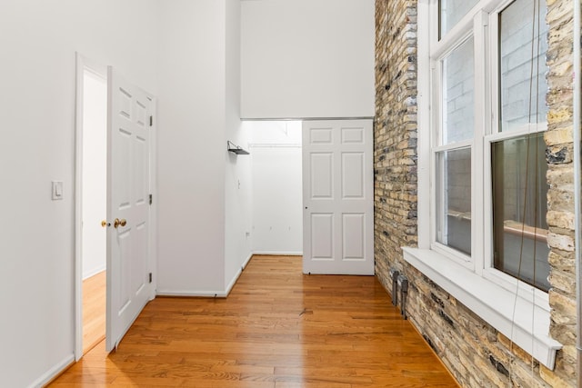 1012 W Diversey Pkwy Unit 2, Chicago, IL 60614 - foyer entrance with light wood-style flooring and baseboards