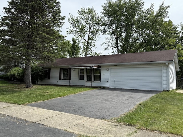 217 Davis Ln, Bolingbrook, IL 60440 - ranch-style house featuring driveway, an attached garage, and a front yard