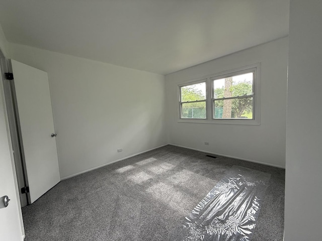 217 Davis Ln, Bolingbrook, IL 60440 - carpeted spare room featuring baseboards