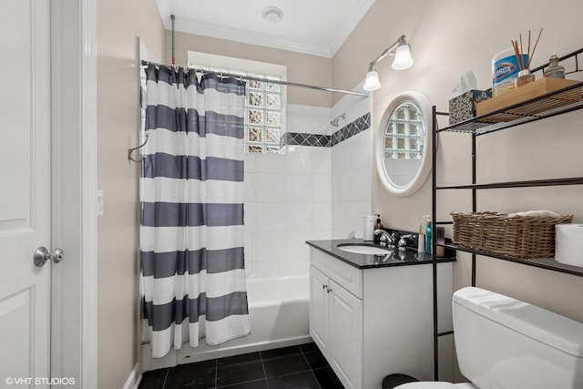 821 Foster St Unit 1N, Evanston, IL 60201 - full bathroom with vanity, shower / tub combo, toilet, tile patterned flooring, and crown molding