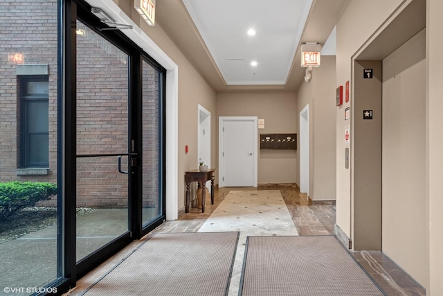 821 Foster St Unit 1N, Evanston, IL 60201 - hallway featuring elevator and recessed lighting