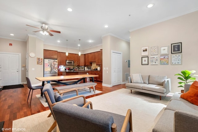 821 Foster St Unit 1N, Evanston, IL 60201 - living room with crown molding, a ceiling fan, recessed lighting, dark wood finished floors, and baseboards