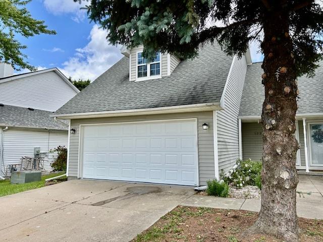 1222 Henry St, Normal, IL 61761 - view of front of property with roof with shingles