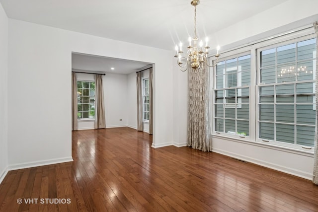 827 Forest Ave, River Forest, IL 60305 - unfurnished room featuring a chandelier and hardwood / wood-style flooring