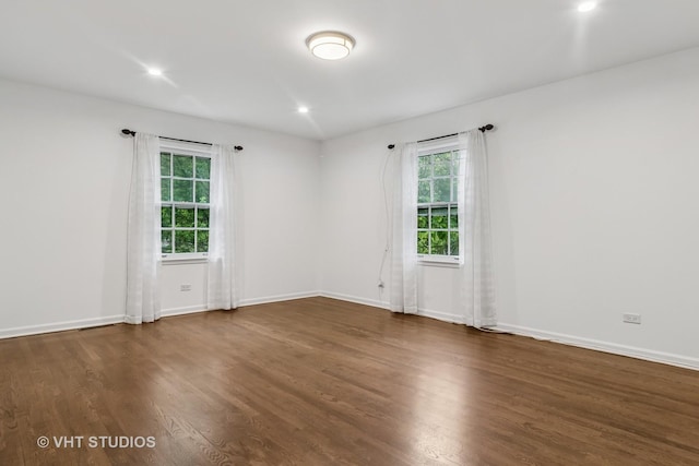 827 Forest Ave, River Forest, IL 60305 - unfurnished room with dark wood-style floors, healthy amount of natural light, and recessed lighting