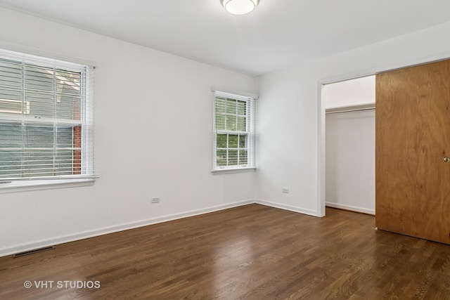 827 Forest Ave, River Forest, IL 60305 - unfurnished bedroom featuring wood finished floors and a closet