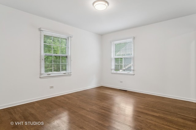 827 Forest Ave, River Forest, IL 60305 - empty room featuring healthy amount of natural light and wood finished floors