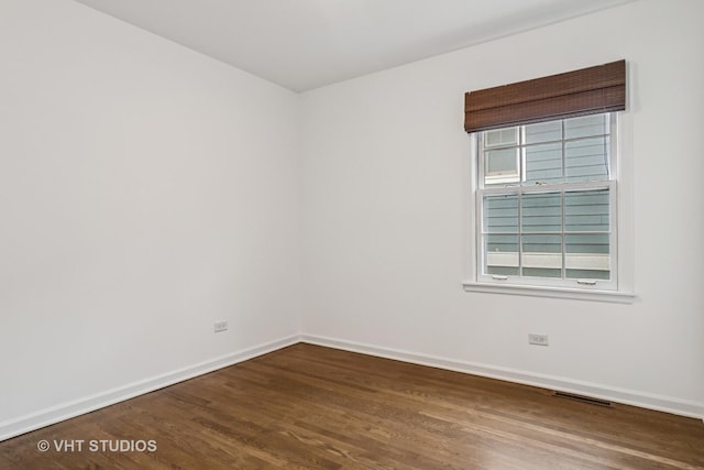 827 Forest Ave, River Forest, IL 60305 - empty room with baseboards and dark wood-style flooring