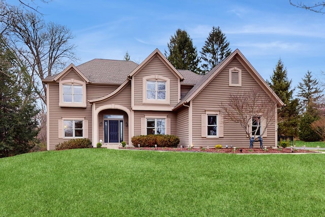 7111 Saddle Oaks Dr, Cary, IL 60013 - view of front of house featuring a front lawn and a shingled roof